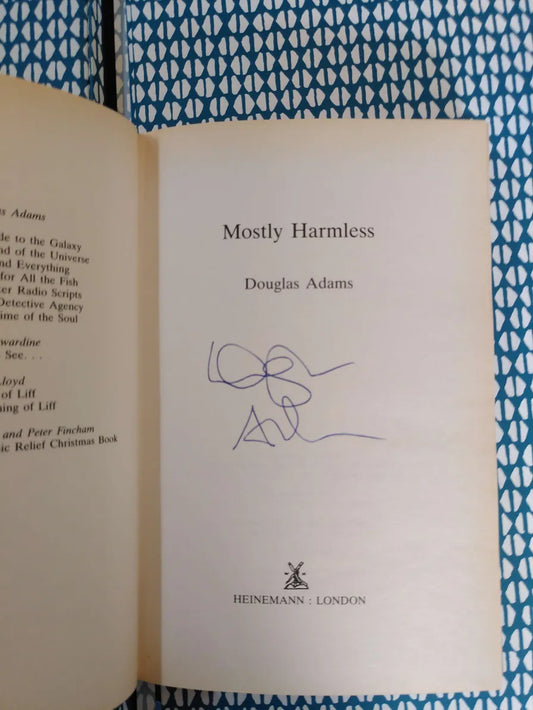 Mostly Harmless, 1st edition, 1st Printing, SIGNED